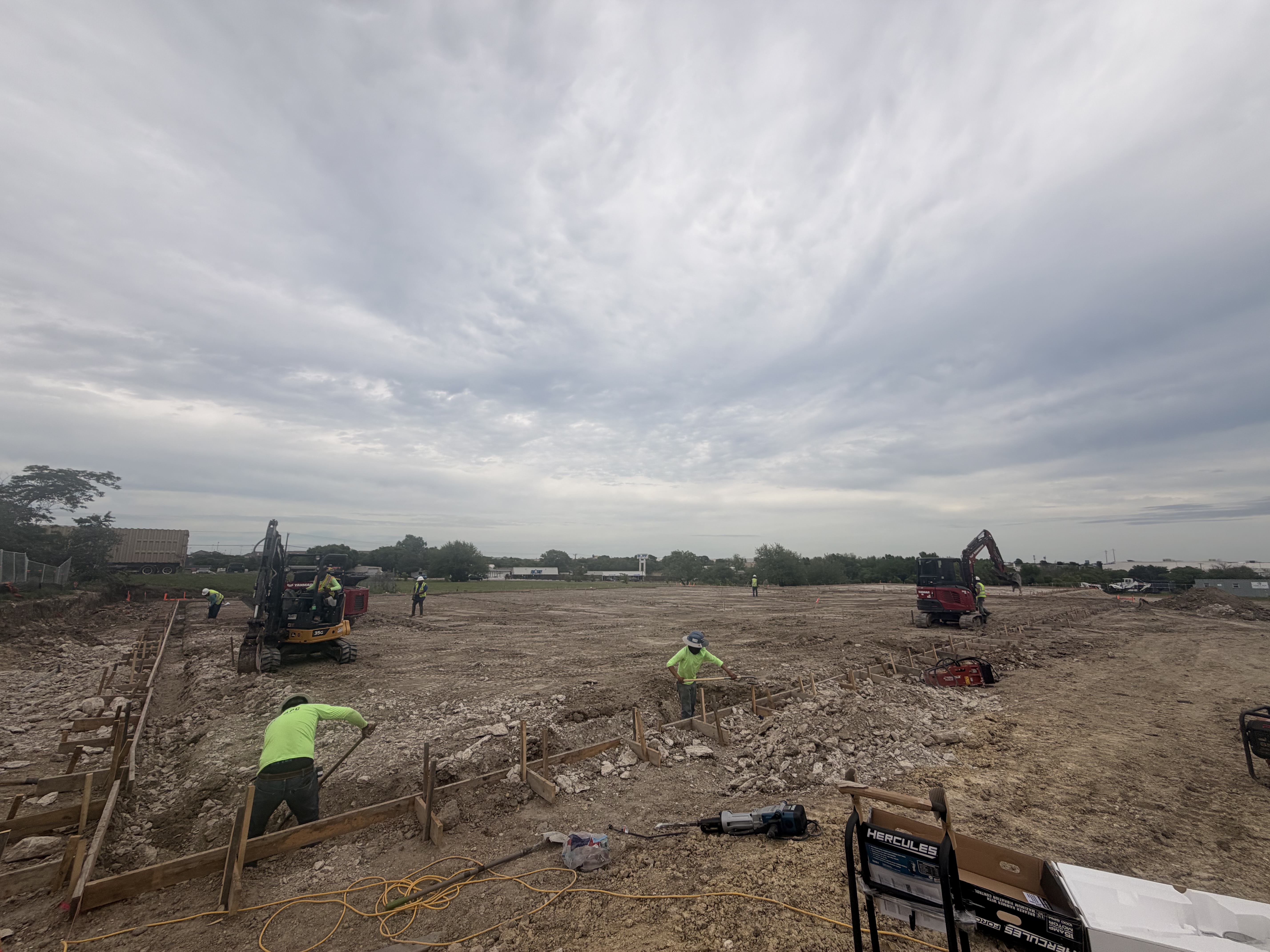 Concrete foundation prep with vapor barrier and rebar grid — APC